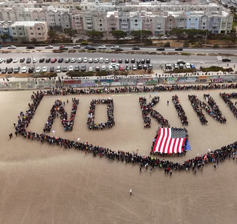Massive “No Kings” Human Banner at Ocean Beach